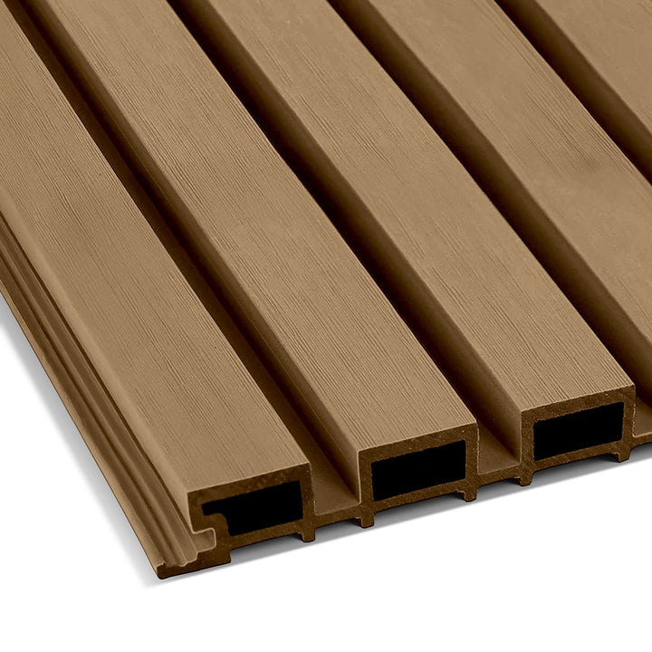 Close-up of the Landmark Decor Teak Color Exterior WPC Panel with wood grain texture. This premium panel has multiple parallel grooves and hollow sections, offering a durable, weather-resistant design perfect for outdoor transformations.