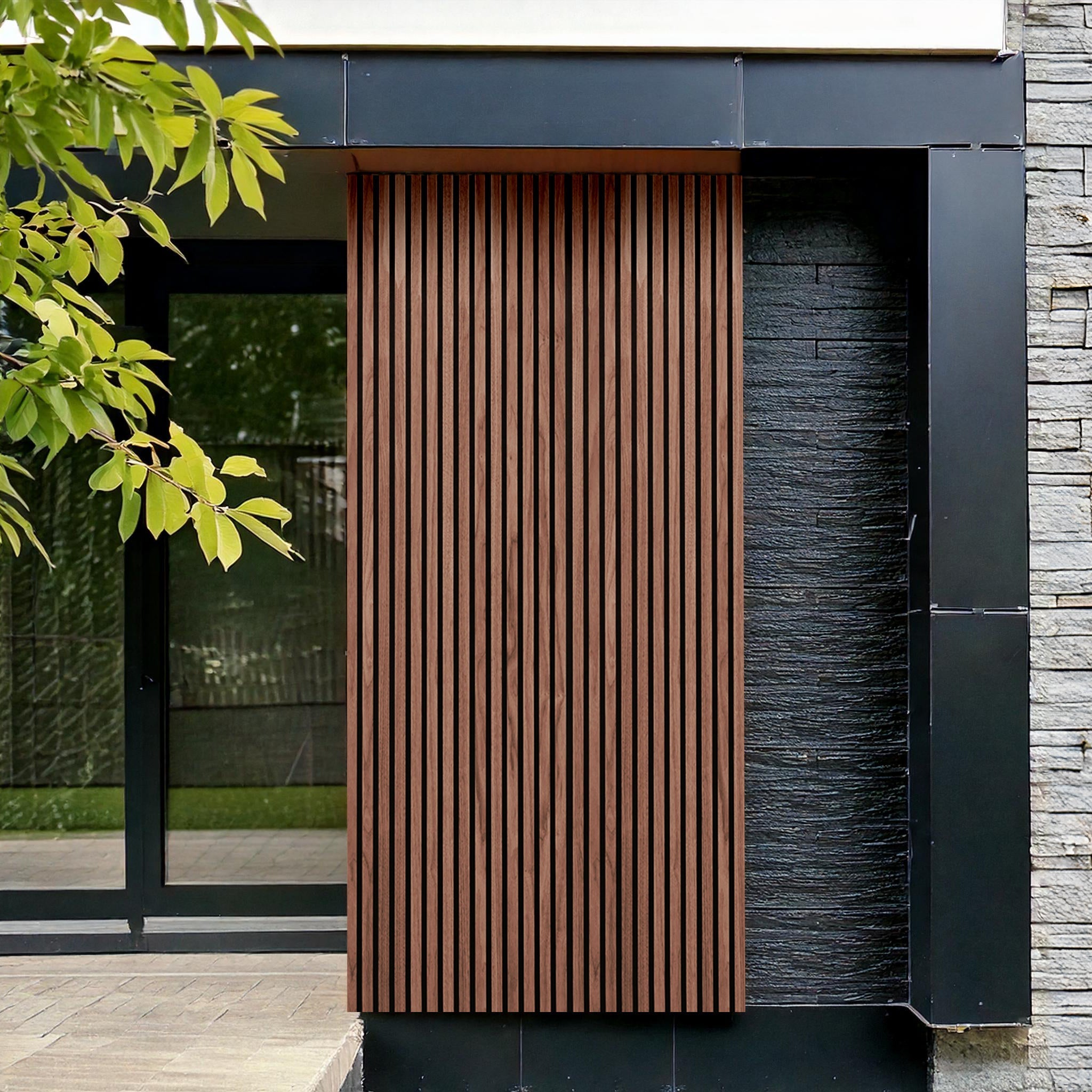 The modern building facade showcases Landmark Decors Redwood Exterior WPC Panels featuring vertical wooden slats on a dark textured wall, weather-resistant and luxurious. Large glass windows peep from behind leafy branches in the upper left corner, complemented by sleek black metal panels.