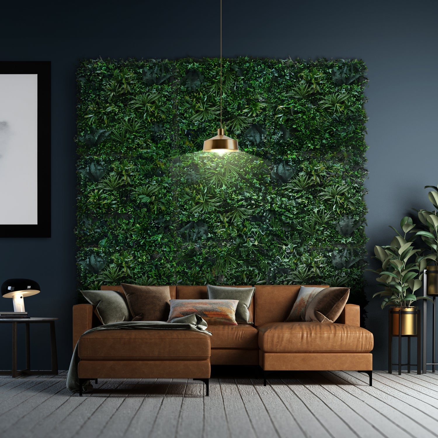 The living room showcases the Emerald Sanctuary, a brown sectional sofa with assorted cushions on a gray carpet. A lush vertical ivy garden by Landmark Decor adorns a dark wall, illuminated by a modern hanging lamp. A side table with a lamp and potted plant completes the look.