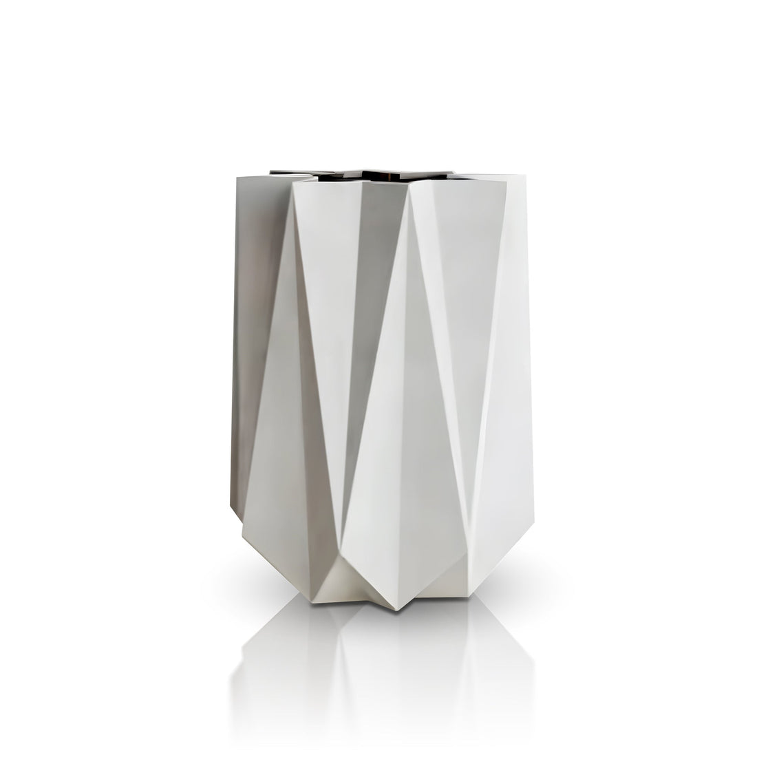 The Visione Astratta Elegant Planter by Landmark Decor is a geometric, faceted metallic piece with a reflective surface and sharp edges. Its symmetric pattern blends luxury and nature, enhancing its modern aesthetic against a white background.