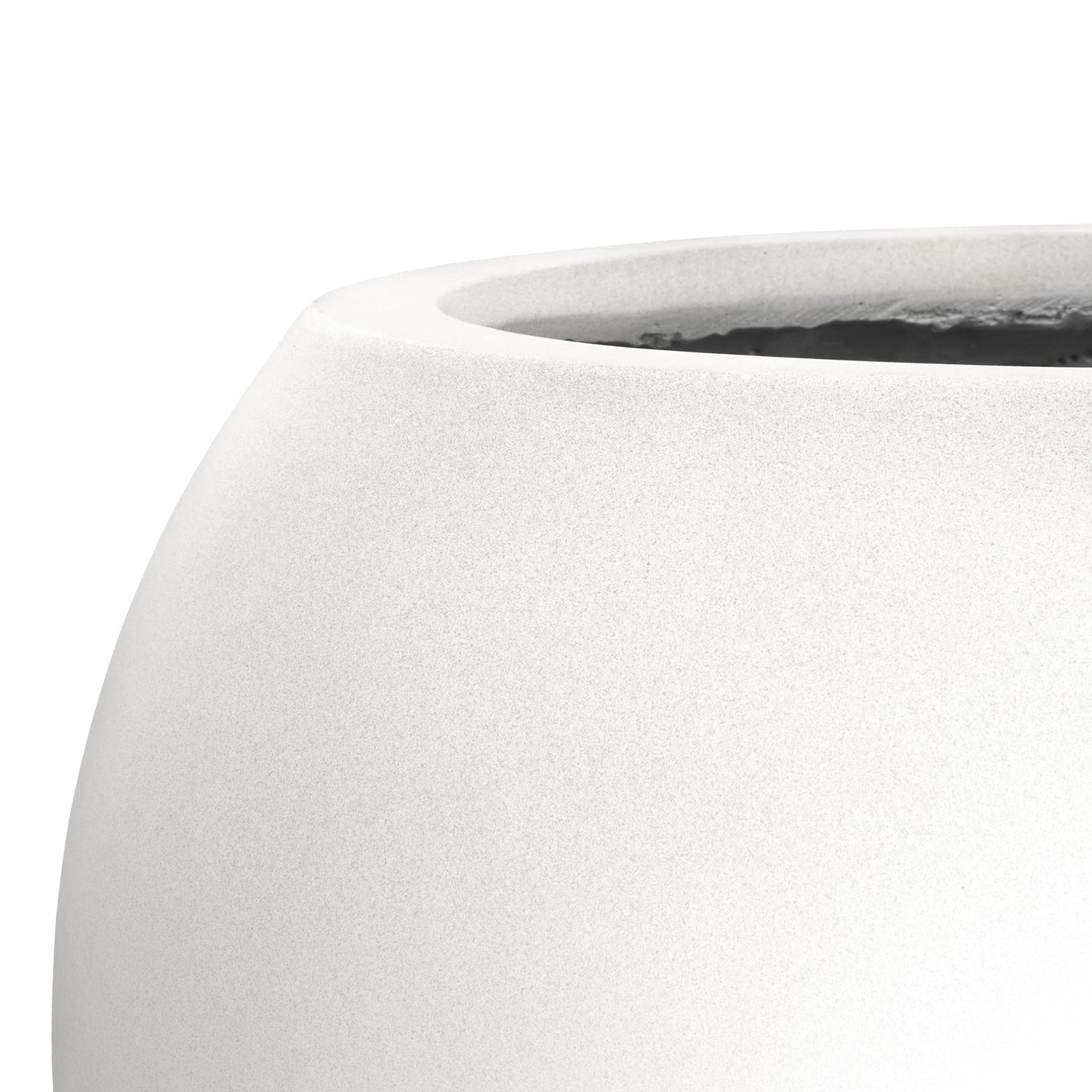 A close-up of the Urban Vessel Planter by Landmark Decor highlights its smooth, white finish and wide opening, casting a shadow that accentuates its curves. The dark interior hints at depth, while the plain white background enhances its luxurious and natural elegance.