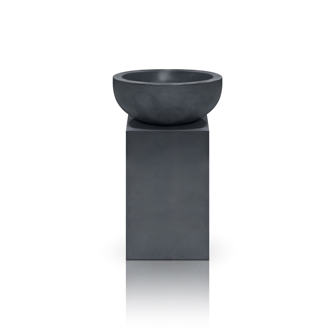 The Obelisk Planter by Landmark Decor is a modern, minimalist piece with a gray round bowl on a tall rectangular pedestal. Its sleek and simple design merges luxury and nature perfectly against a plain white backdrop.