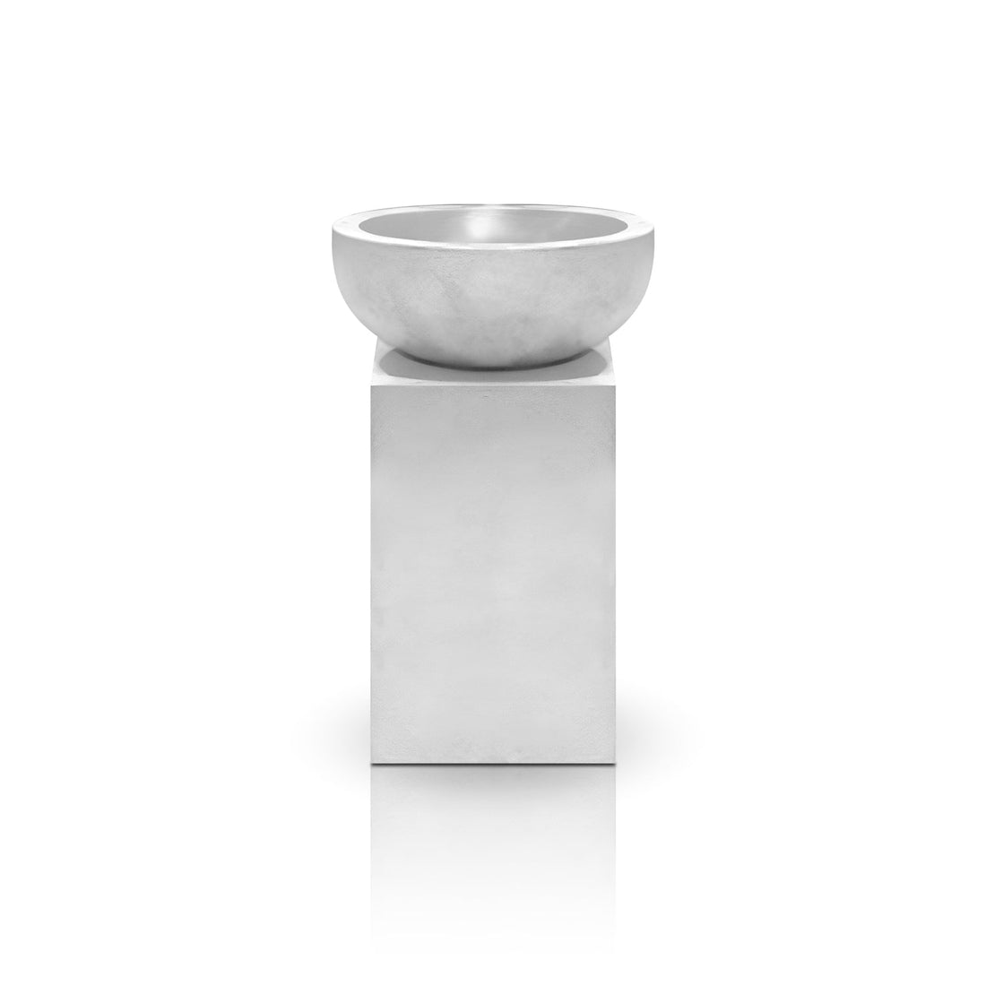 The Obelisk Planter by Landmark Decor is a minimalist white sculpture with a round bowl on a rectangular pedestal, exuding luxury and modernity. Its smooth surfaces and simplicity echo custom trees in handmade planters that blend nature with contemporary design.