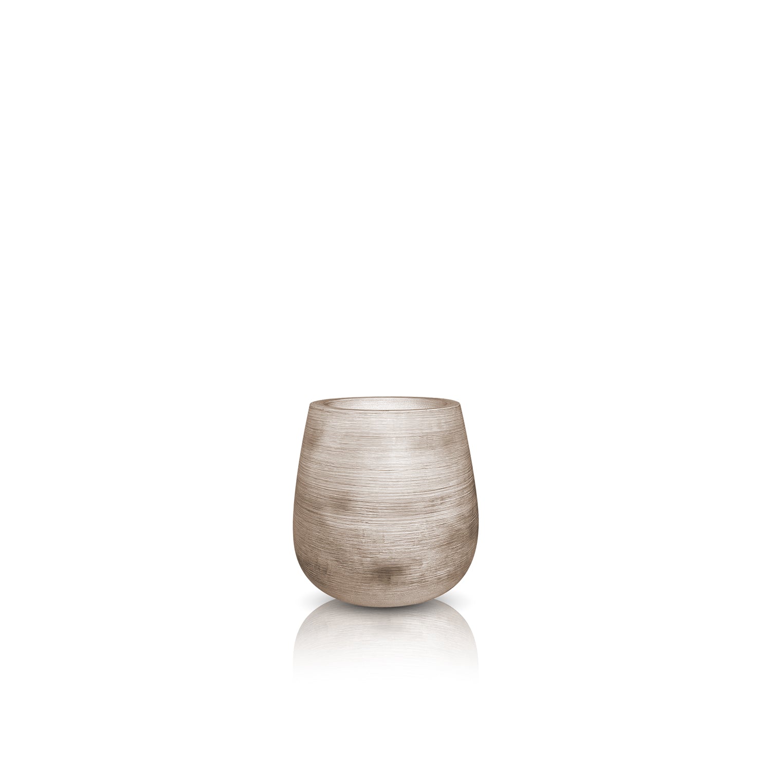 A minimalist image shows a Landmark Decor Artisan Luxe Planter, featuring a light brown textured ceramic cup with a rounded shape. Resting on a white background with its reflection below, the small planter is adorned with subtle horizontal lines reminiscent of handmade design.