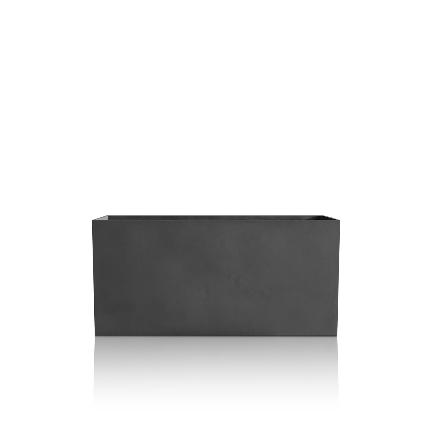 The Minimalist Oasis Planter - Medium by Landmark Decor features a sleek, black rectangular design that embodies luxury and nature. Handmade with a smooth surface, it sits against a white background, subtly reflecting elegance.