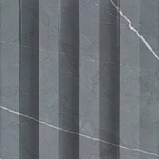 The Black Marble WPC Fluted Slat Wall Panel by Landmark Decor features a textured surface with vertical ridges and subtle white veining, perfect for elegant wall cladding or interior panels.
