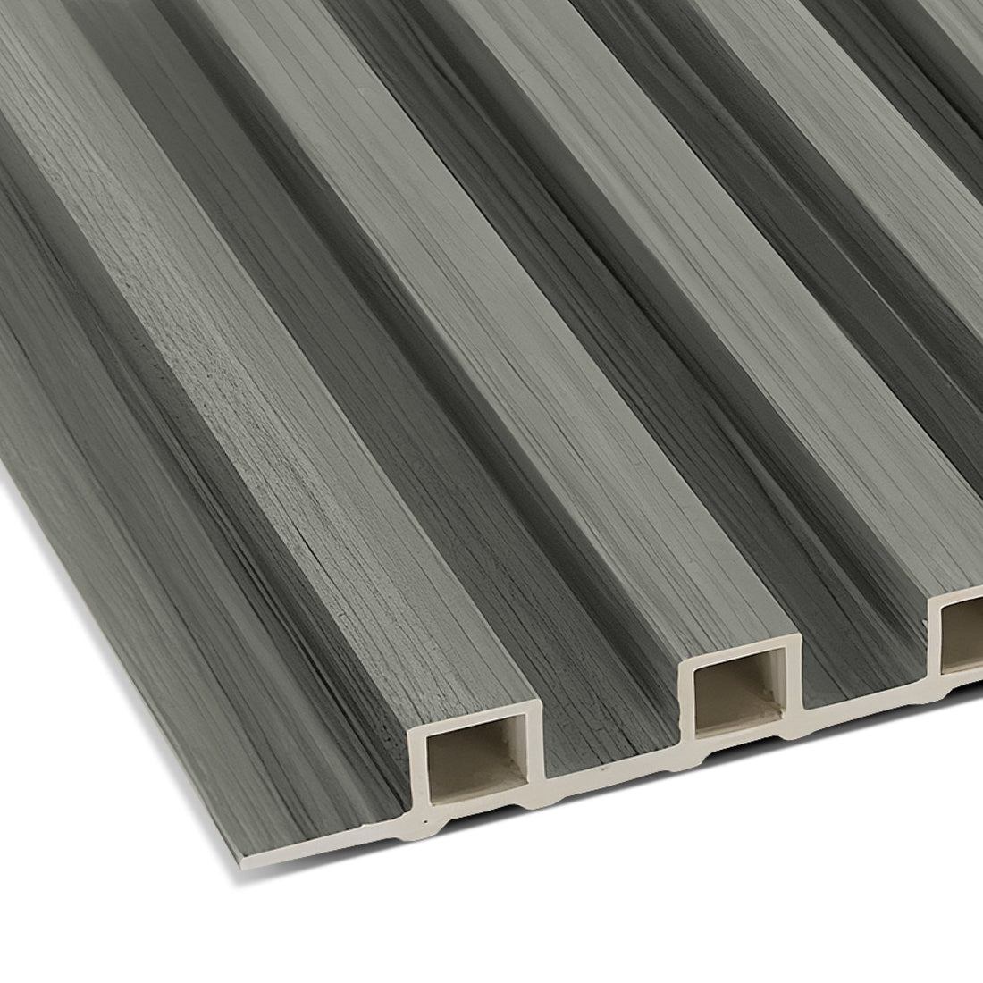 Close-up of the Light Gray WPC Fluted Slat Wall Panel by Landmark Decor, showcasing its gray, rectangular design with lengthwise ridges and visible hollow sections at the edges for a textured, lightweight appearance ideal for accent walls.