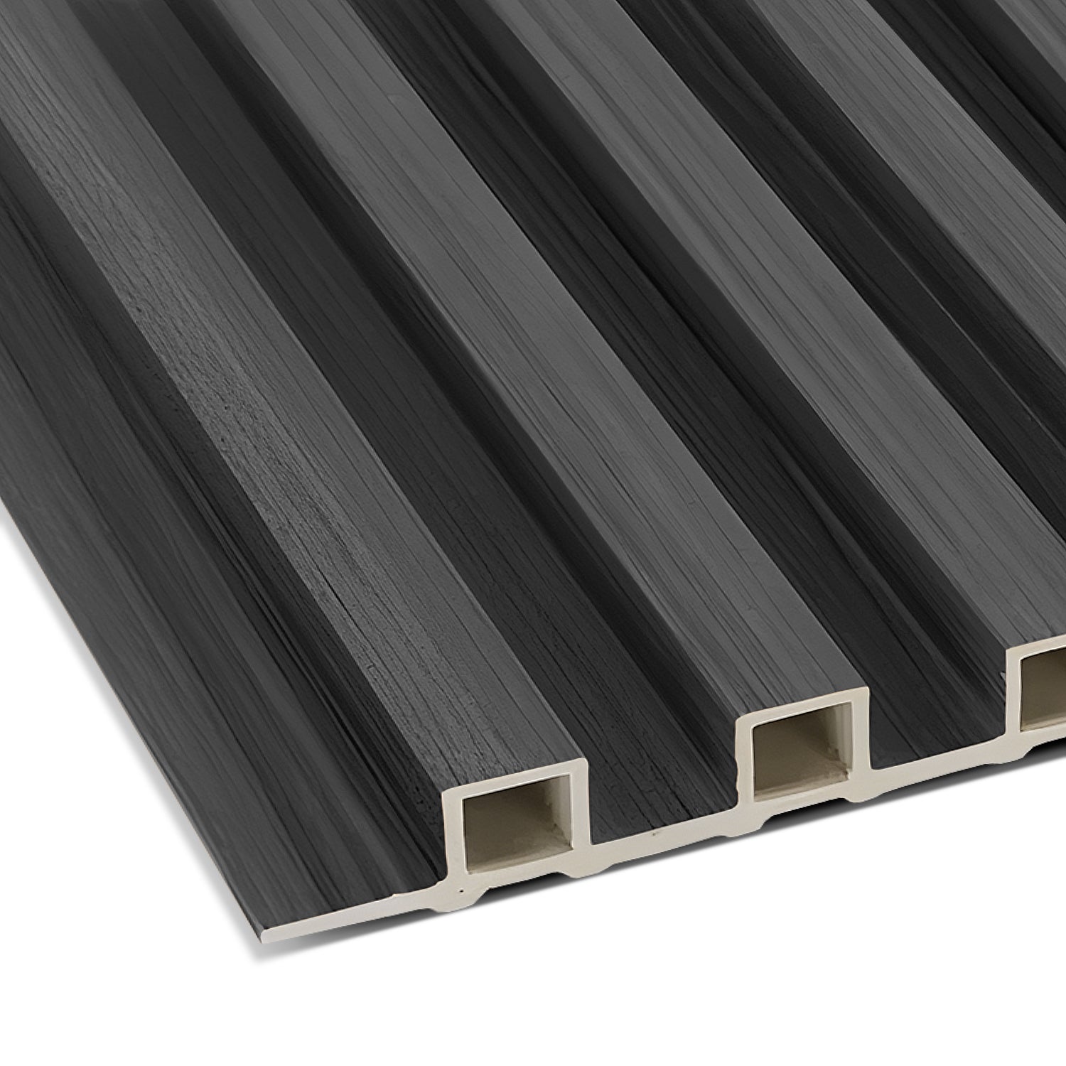 Close-up of the Dark Gray WPC Fluted Slat Wall Panel by Landmark Decor, ideal for accent walls, featuring a ridged surface and hollow channels. The edges highlight the contrasting light-colored interior, showcasing the panels structure and texture.