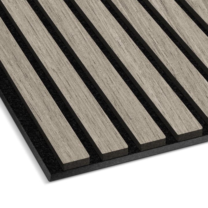 A close-up of Landmark Decors Light Gray Acoustic Slat Wall Panel showcases parallel real wood slats against a dark background. The light gray, textured surface creates a luxurious ambiance and elegantly contrasts with the dark base in an evenly spaced pattern.